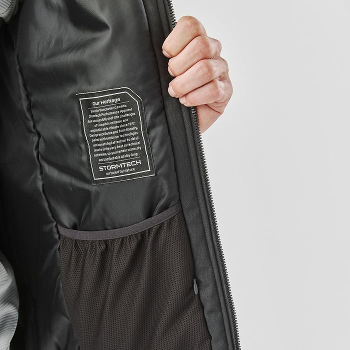Men's Athabasca Thermal Jacket - A men's thermal jacket featuring a grey interior, a pocket, and a logo on the label inside.
