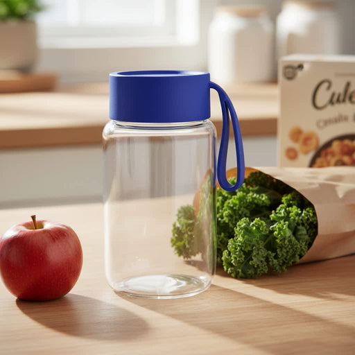 Kyoto Glass Bottle - A drink bottle with a clear body and a blue lid, featuring a carrying handle, placed on a wooden surface.