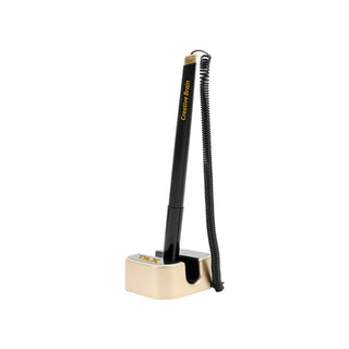 Counter Fixed Signature Pen E - A black signature pen with a coiled cord, attached to a tan holder. The holder features a logo.
