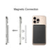 5000mAh Magnetic Wireless  Power Bank - A magnetic wireless power bank in black, positioned next to a smartphone, featuring a logo on the device.
