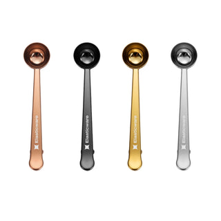Coffee Measuring Spoon With Clip - Coffee measuring spoons in copper, black, gold, and silver, with clips and a logo on the handles.