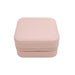 PU Leather Jewellery Box - A pink PU leather jewellery box with a textured surface and a zipper closure. It has a simple, compact design.