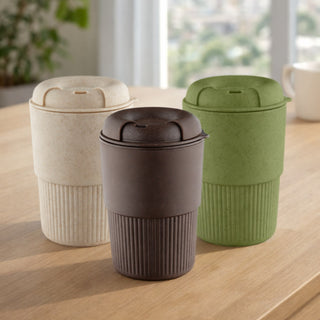Ecco Kuppa – EcoBlend - A drink bottle in three colours: cream, dark brown, and green, with a ribbed design and a lid, featuring a logo.