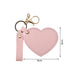 Heart-Shaped Compact Mirror with Keychain - A heart-shaped compact mirror in pink, attached to a keychain with a lobster clasp and a strap.