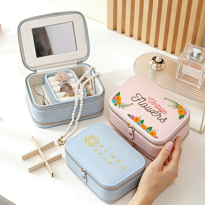 Fashion PU Leather Jewellery Case with Mirror - A pink and blue fashion PU leather jewellery case with a mirror, featuring decorative floral designs and interior compartments.