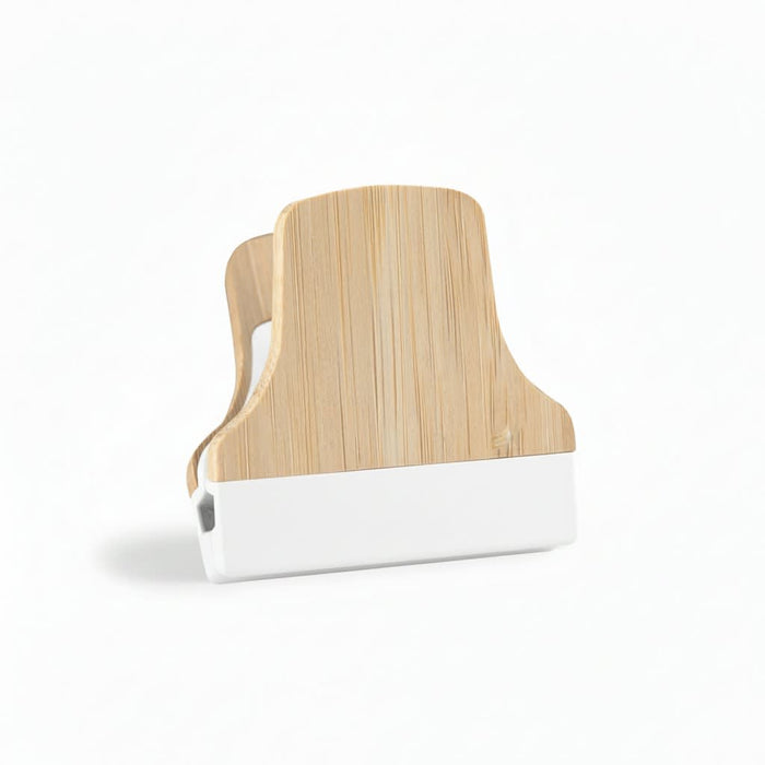 Bamboo Fridge Magnet Clip - A bamboo fridge magnet clip featuring a natural bamboo finish and a white base. It has a simple, modern design.