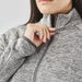 Women's Yosemite Full Zip Fleece Jacket - A close-up of a woman's neck and shoulder wearing a grey full zip fleece jacket with a high collar.