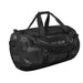 Stormtech Gear Bag Medium - A medium black duffle bag with handles and a shoulder strap, featuring a logo on one side.