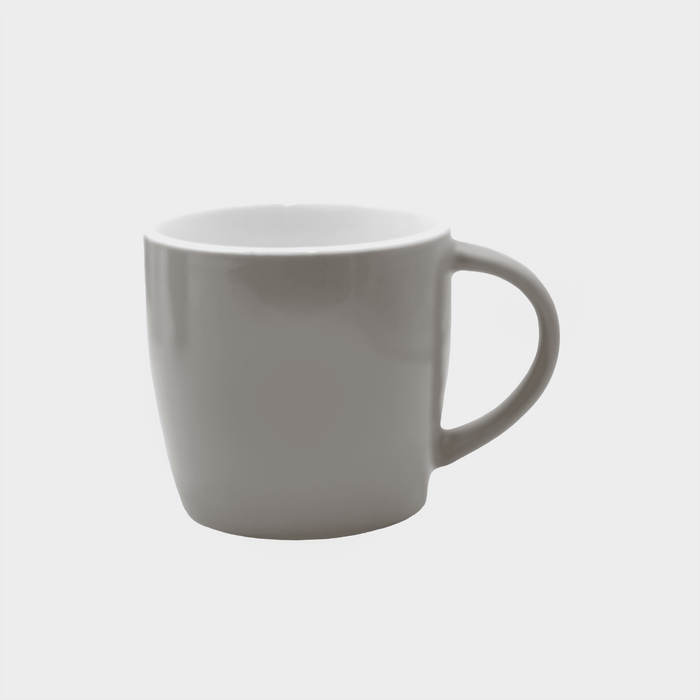The Maxwell 330ml Ceramic Mug - A ceramic mug in a light grey colour with a smooth finish and a curved handle. It features a logo on the side.