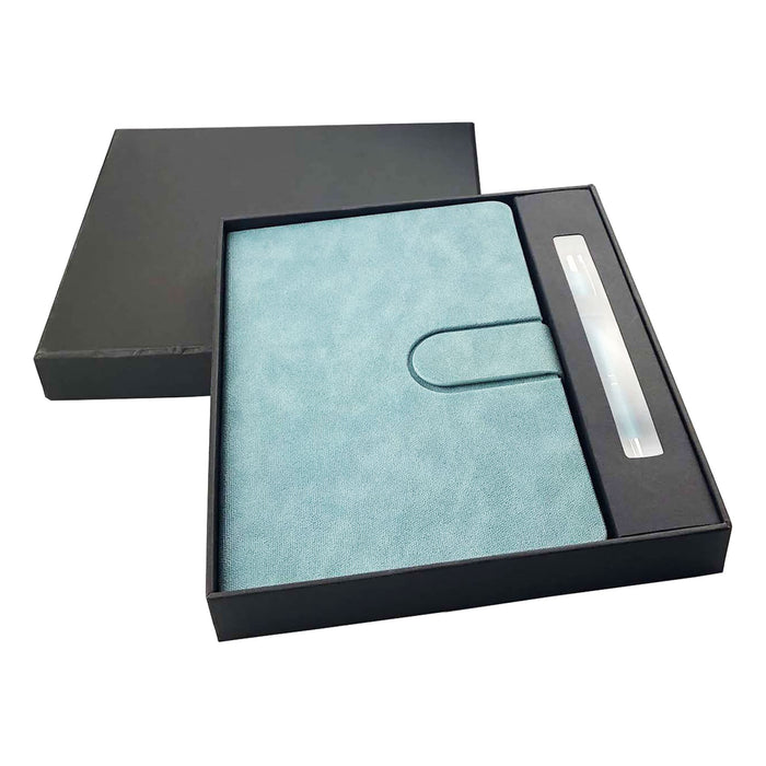 Rewiz Notebook and Pen Gift Set - A turquoise notebook with a matching pen, presented in a black gift box. Contains a logo.