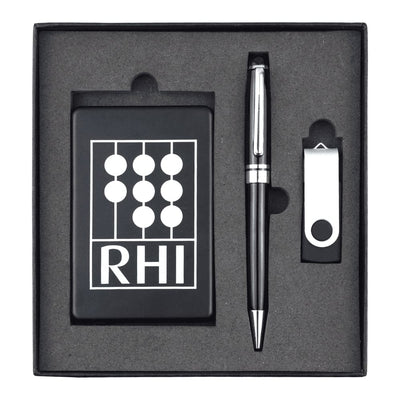Powerbank, USB (4GB) & Pen Giftset - A black gift set containing a pen, a USB drive, and a card holder, all neatly arranged in a black box with a logo.