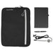 Work Essentials Pack - A black zippered pouch, a black notebook, a silver pen, and a charging cable with a circular connector. The pouch has a logo.