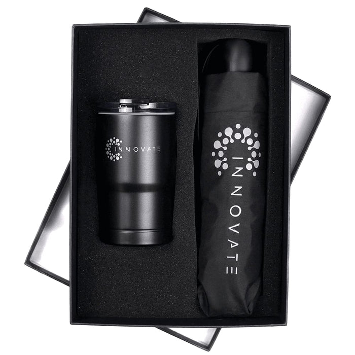Umbrella & Tumbler Gift Set - A black tumbler and an umbrella presented in a black gift box with a logo.