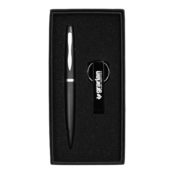 Chicago Pen & Bottle Opener Keyring Gift Set - A black pen and bottle opener keyring set nestled in a black gift box with a branded logo.