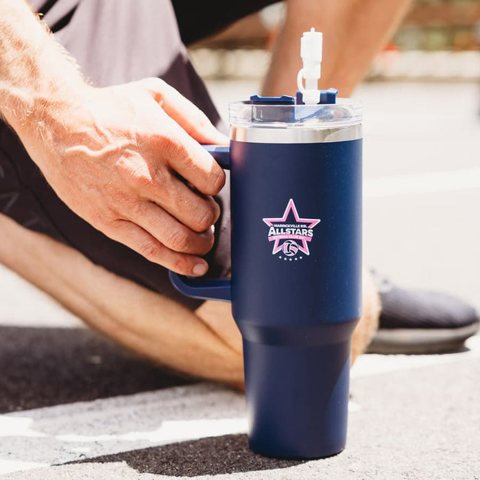 The Hippo 1.2L Mug - A drink bottle in navy blue with a straw and a logo. The design features an easy-grip handle.