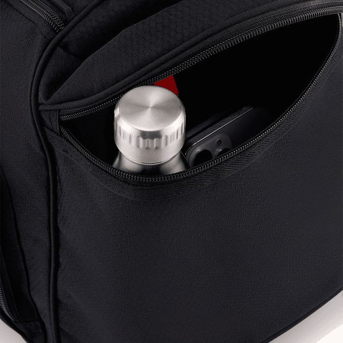 High Sierra Travel Duffel - A black travel duffel featuring a zippered pocket with a silver drink bottle and a phone inside.