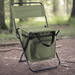 HYDE Foldable Camping Chair with Cooler Bag - A green foldable camping chair with a cooler bag attached, set on a forest floor. It features a zippered cooler compartment.
