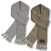 Ruga Knit Scarf - A pair of Ruga Knit Scarves in light grey and olive green, featuring a branded logo and fringed ends.