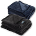 Coral Fleece Blanket - A folded coral fleece blanket in navy blue and a second in charcoal grey, both with a logo.