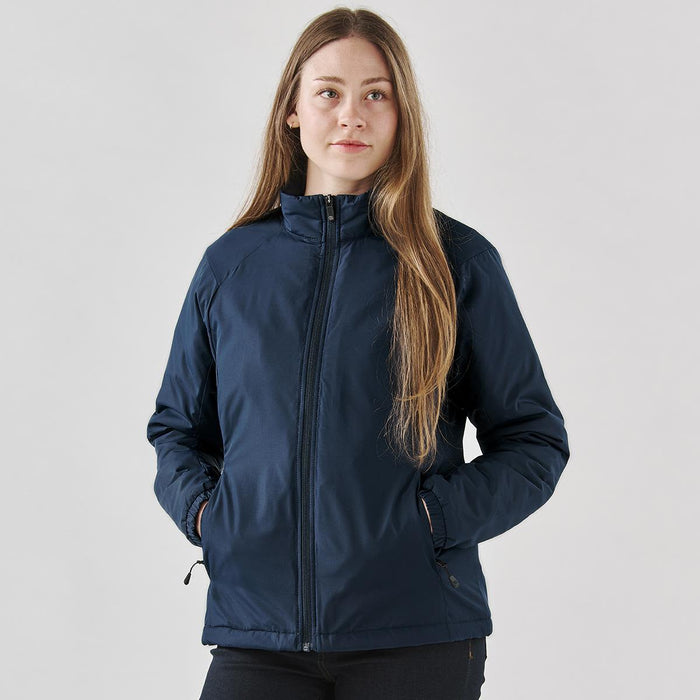 Women's Pacifica Thermal Jacket - A women's thermal jacket in navy blue, featuring a zip front and side pockets, with a logo on the sleeve.