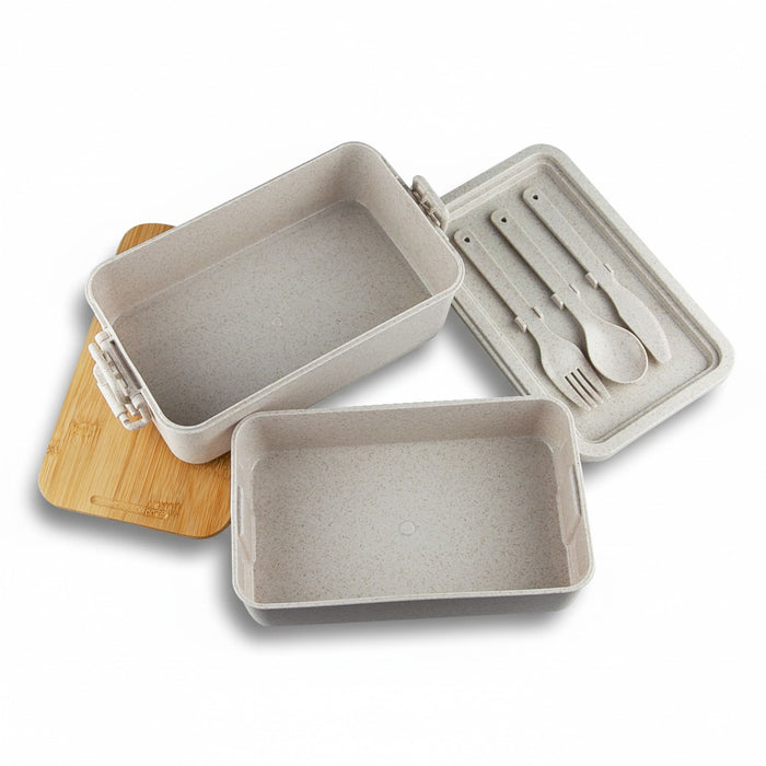 Bamboo Stack & Go Lunch Box - A stackable bamboo lunch box in beige, featuring two containers and a wooden lid, with utensils included.