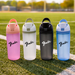 The Bondi 700ml Drinking Bottle - A drink bottle collection featuring pink, white, black, and blue designs with a logo on each bottle.