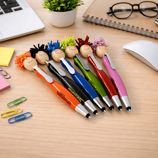 Mop Head Pen with Stylus - A set of six colourful Mop Head Pens with Stylus, featuring playful character toppers, displayed on a desk.