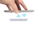 Proton Wireless Charger - A wireless charger with a hand positioning a smartphone above it, indicated by wireless signal symbols.