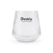 Velora Tumbler by The Line Edit. - A clear glass tumbler with ribbed texture and a logo at the front.