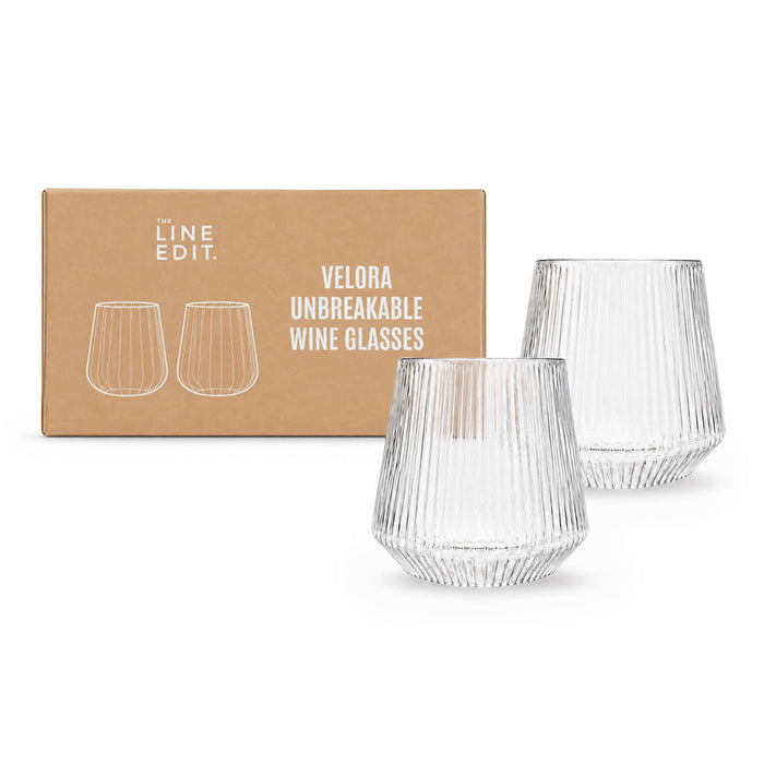 Velora Tumbler Gift Set by The Line Edit. - Two unbreakable clear glass wine glasses with a ribbed design, presented in a cardboard packaging.
