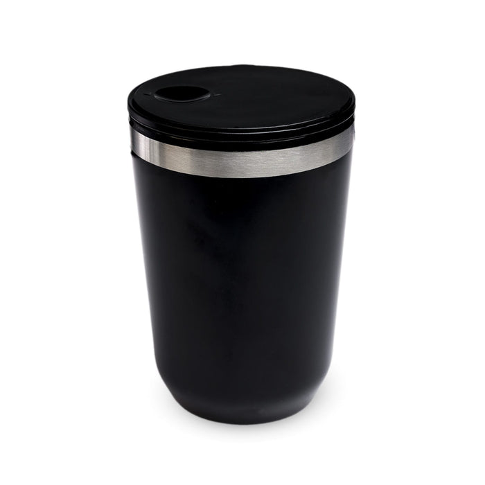 The Pause Pack - A reusable coffee cup in black with a stainless steel band and a lid featuring a drinking opening.