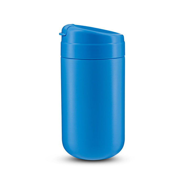 Esplanade Coffee Cup by The Line Edit. - A blue coffee cup with a lid and a smooth surface, featuring a logo.