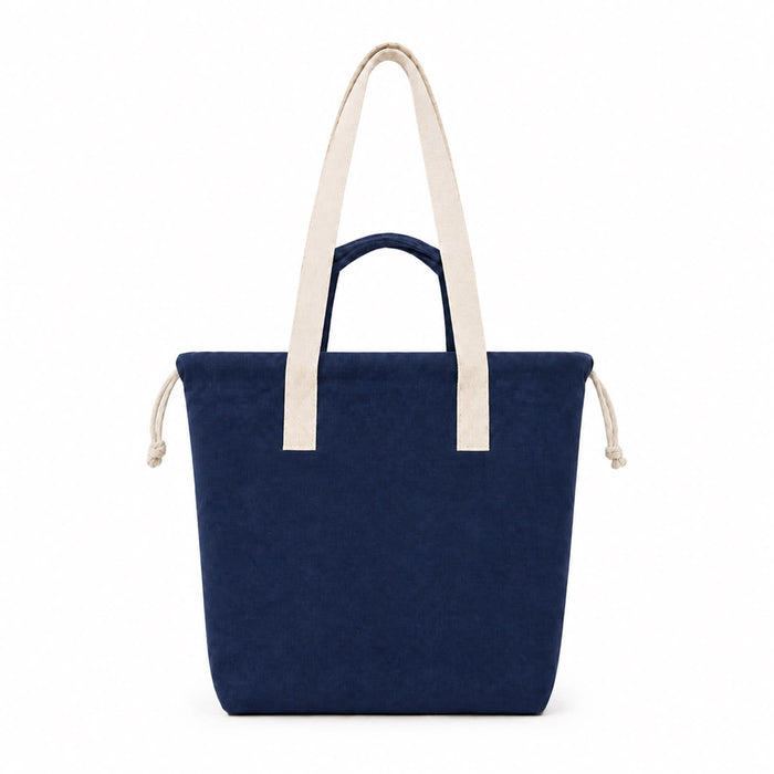 Darby Tote Bag - A navy blue tote bag with cream-coloured handles and a drawstring closure, featuring a logo.