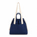 Darby Tote Bag - A navy tote bag with cream handles and a drawstring closure, featuring a front pocket and branding.
