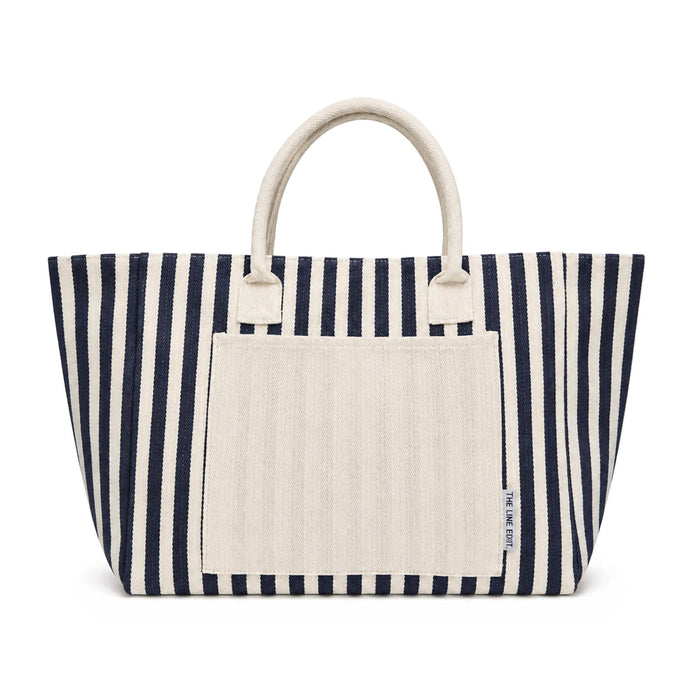 The Play & Graze - A navy and cream striped tote bag with two sturdy handles and a front pocket. It features a branding logo.