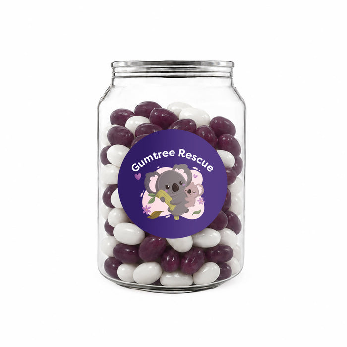 Corporate Colour Jelly Beans in Clear Can 210g - A clear jar filled with purple and white jelly beans. The jar features a colourful label with a logo.