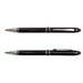 The Daily Setup - A metal pen set featuring sleek black finishes with silver detailing and a logo.