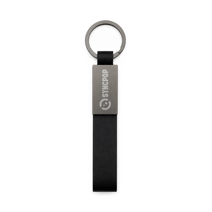 Zander Keytag - A black keytag with a silver metal plate and a keyring attachment, featuring a logo on the plate.