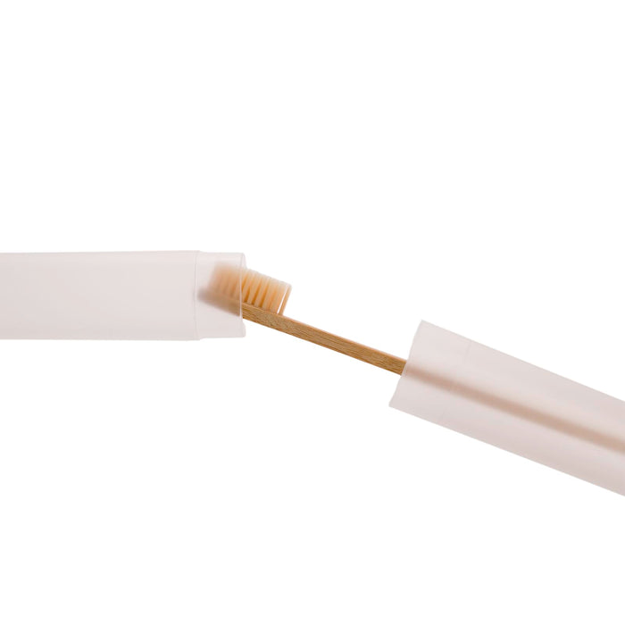 Sparkle Toothbrush Case - A toothbrush case with a translucent design, partially open to reveal a toothbrush inside.
