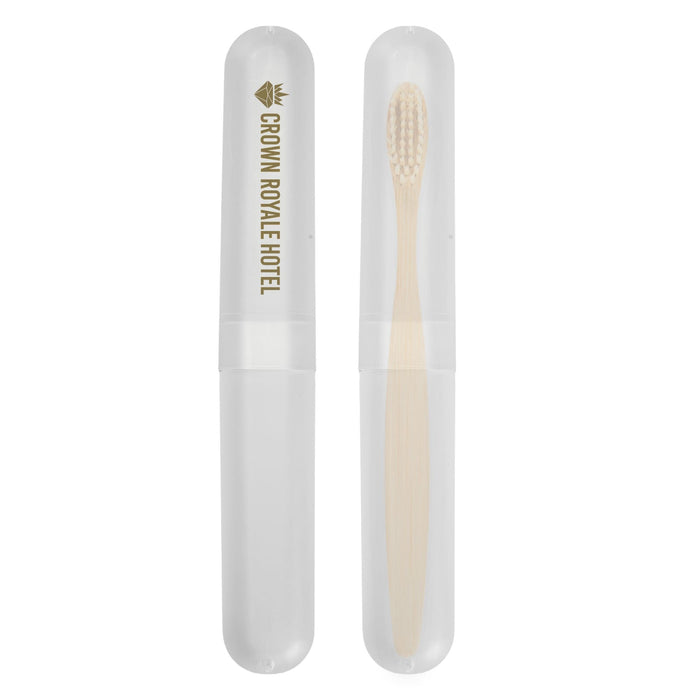 Sparkle Toothbrush Case - A toothbrush case featuring a transparent exterior and a bamboo toothbrush inside, labeled with "Crown Royale Hotel."