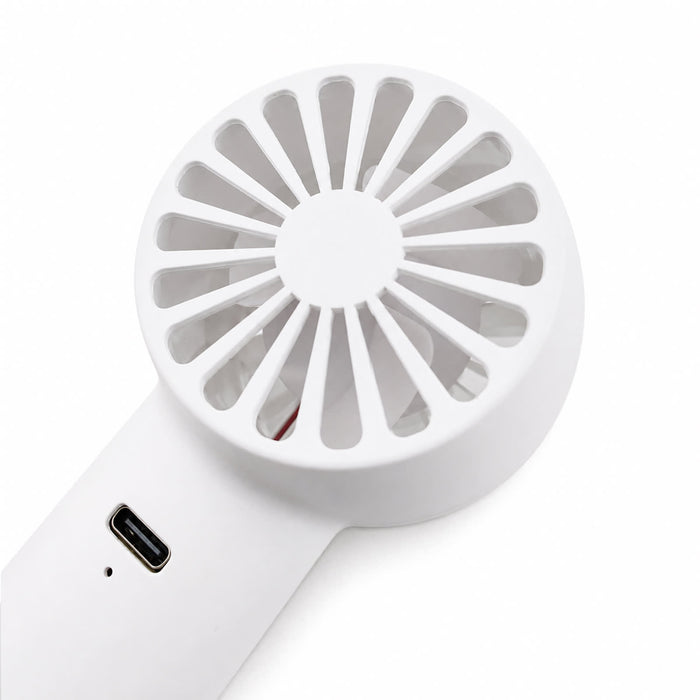 Nomad Rechargeable Fan - A white rechargeable fan with a circular, slotted design and a USB-C port. It features a compact and portable build.