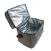 The Good Things - A grey cooler bag with an open lid, featuring a silver insulated interior and a side handle.