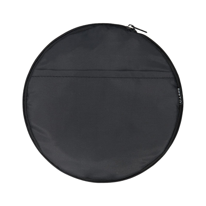 The Game Day Pack - A round black duffle bag with a zip closure and a flat pocket on one side. It features a logo.
