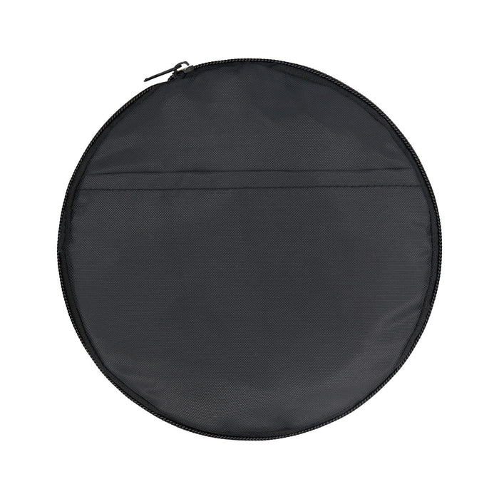 The Escape Pack - A round, black duffle bag with a zip closure and a flat exterior pocket. It features a logo.