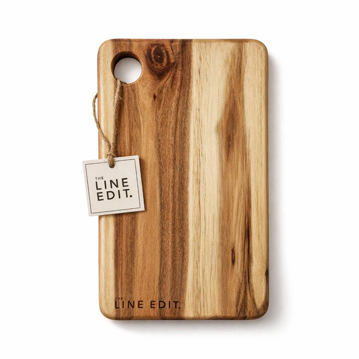 The Coastal Edit - A wooden cheese board with a smooth finish, featuring natural wood grain and a tag for branding.