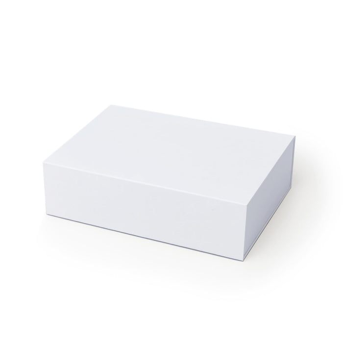 The Daily Setup - A plain white box with a rectangular shape, featuring a smooth surface and no visible branding.