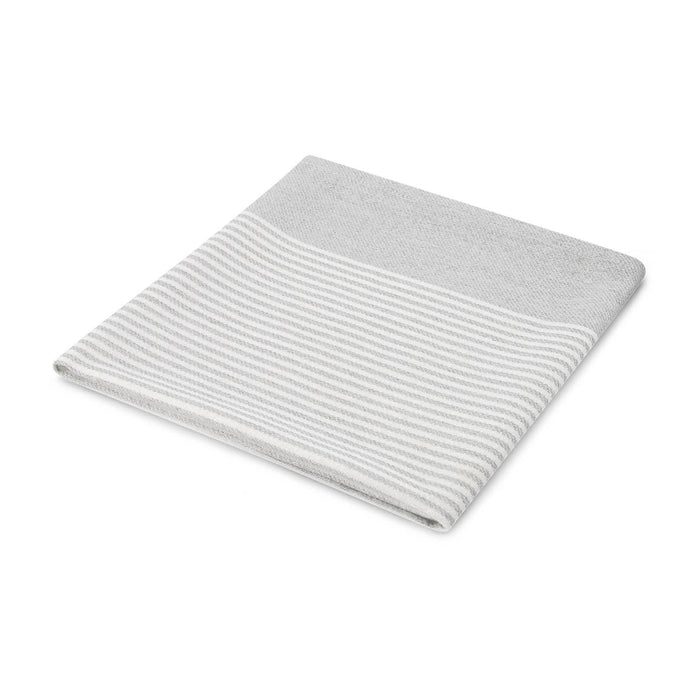 The Nibble Set - A folded grey towel with a striped design at the top. It features a soft texture and a simple, modern look.