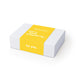 The Brew Ritual - A gift box with a white exterior and a bright yellow band, featuring minimalist text.