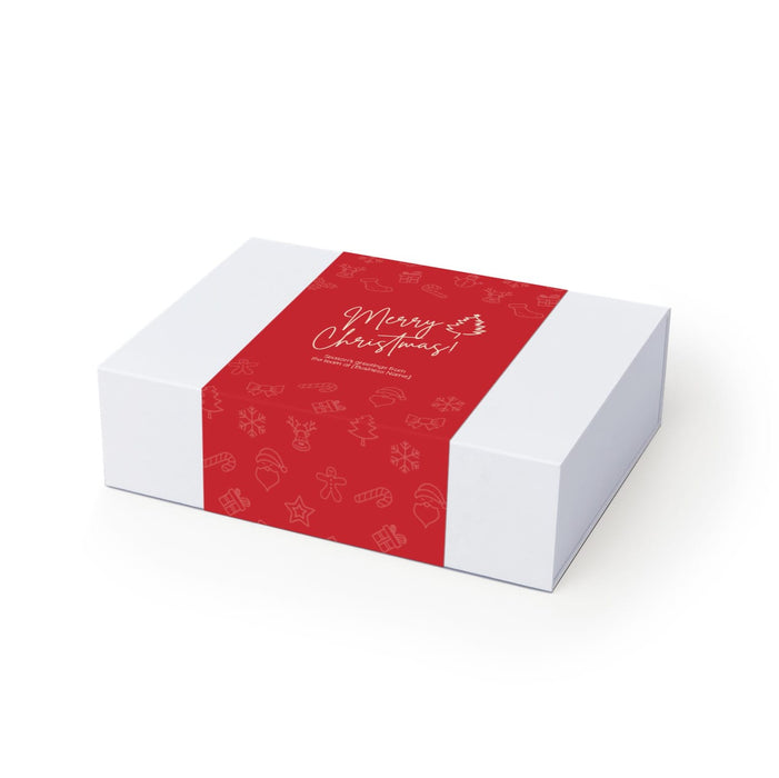 The Host Edit - A gift box with a white base and a red wrap featuring festive holiday designs and a greeting.