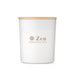 The Host Edit - A white candle jar with a wooden lid, featuring a logo and branding for "Zen Health & Spa."